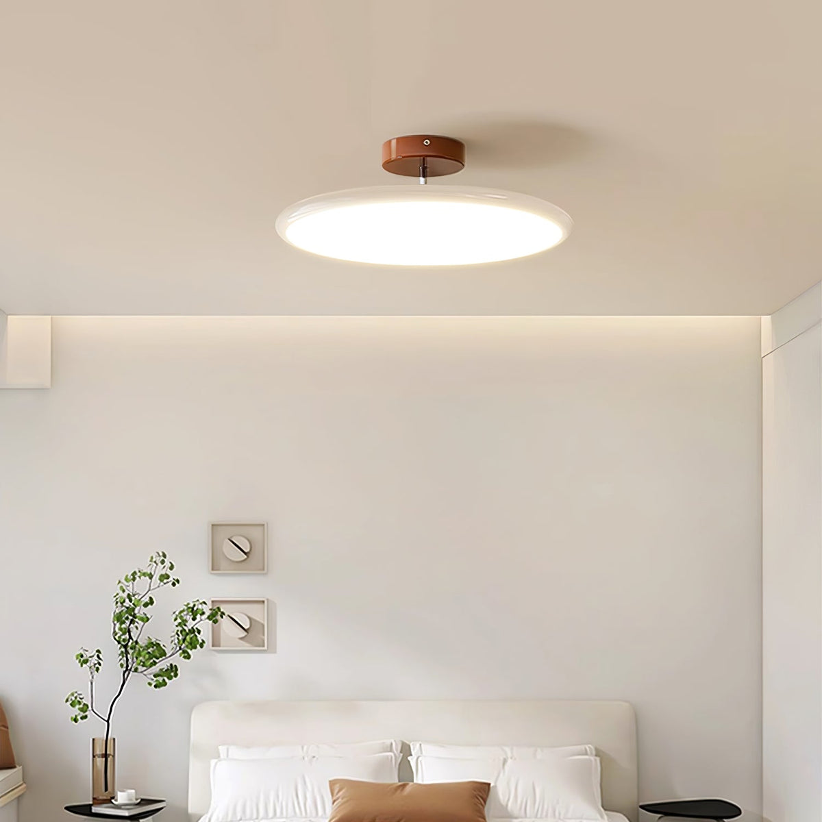 Orbitra flush mount LED ceiling light with swivel arm, white disk and brown canopy on Tampa Home & Garden Store