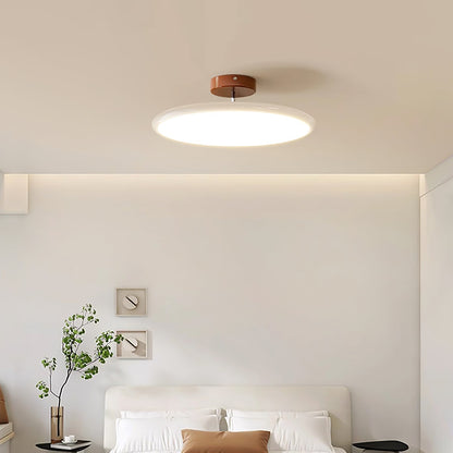 Orbitra flush mount LED ceiling light with swivel arm, white disk and brown canopy on Tampa Home & Garden Store