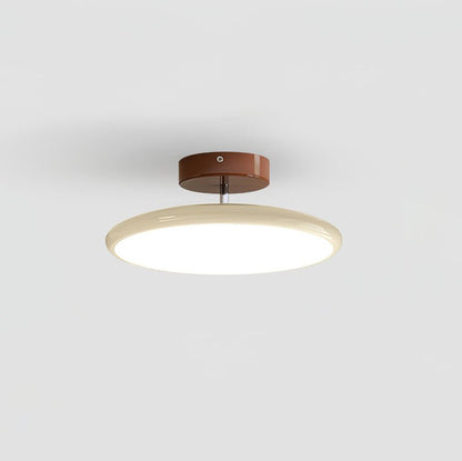 Orbitra flush mount LED ceiling light with swivel arm in beige ring and bronze mount on Tampa Home & Garden Store