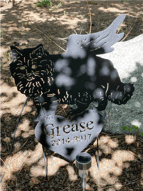 Long Haired Cat yard art in black metal with winged cat and Grease 2014-2017 plaque on Tampa Home & Garden Store