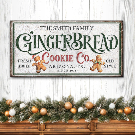 Family Gingerbread Sign canvas with green Gingerbread text and cookies on rustic backdrop on Tampa Home & Garden Store