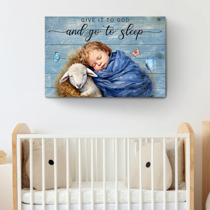 Canvas faith sign X Give It To God And Go To Sleep on blue backdrop with child and lamb on Tampa Home & Garden Store
