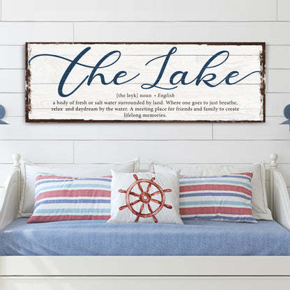 Canvas sign The Definition Of Lake with whitewashed wood, blue script Lake, brown frame on Tampa Home & Garden Store