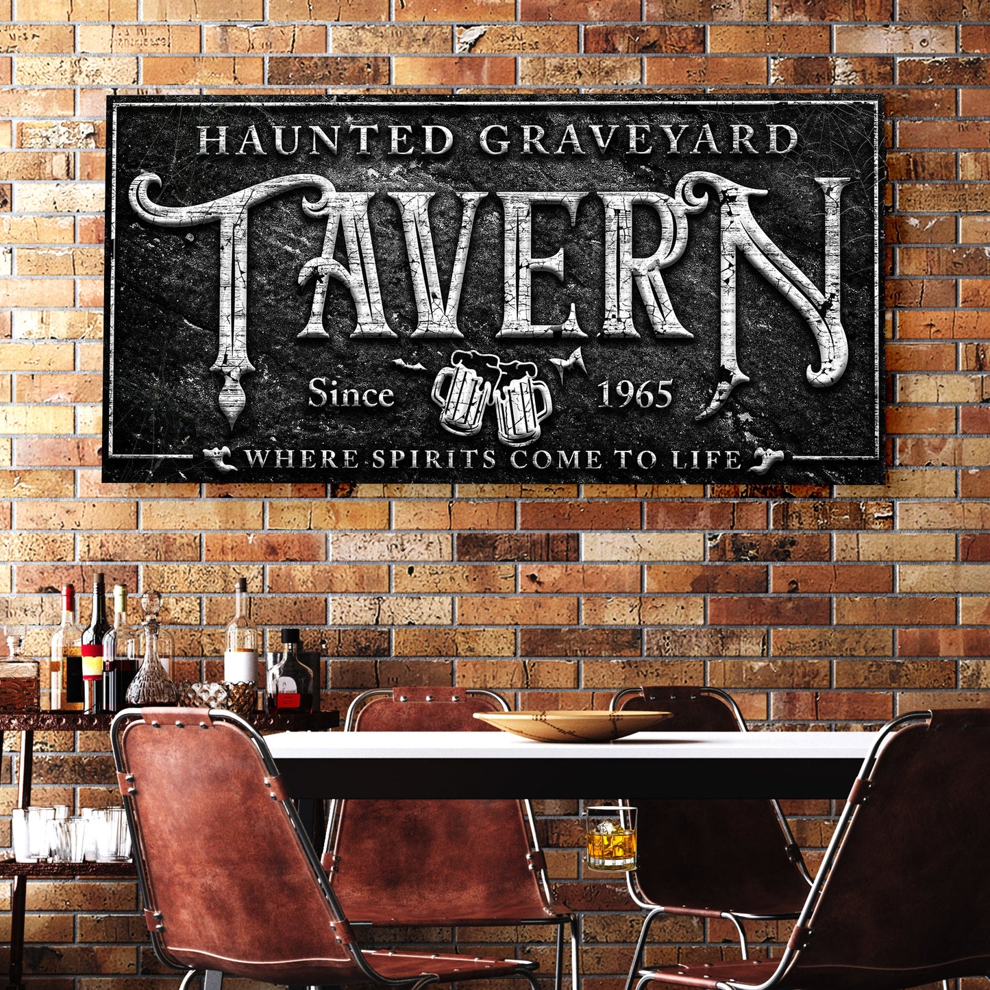 Haunted Graveyard Tavern canvas sign with black panel and white ornate lettering on Tampa Home & Garden Store