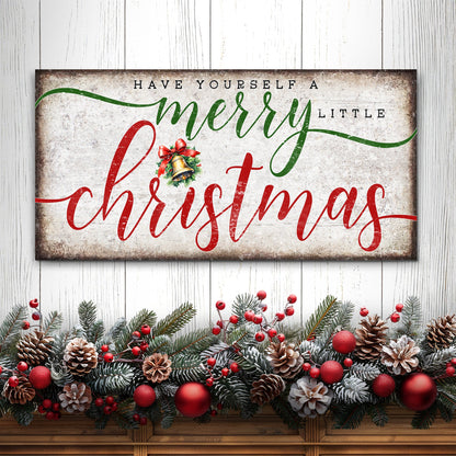 Canvas Have Yourself A Merry Little Christmas in green and red script on rustic backdrop on Tampa Home & Garden Store