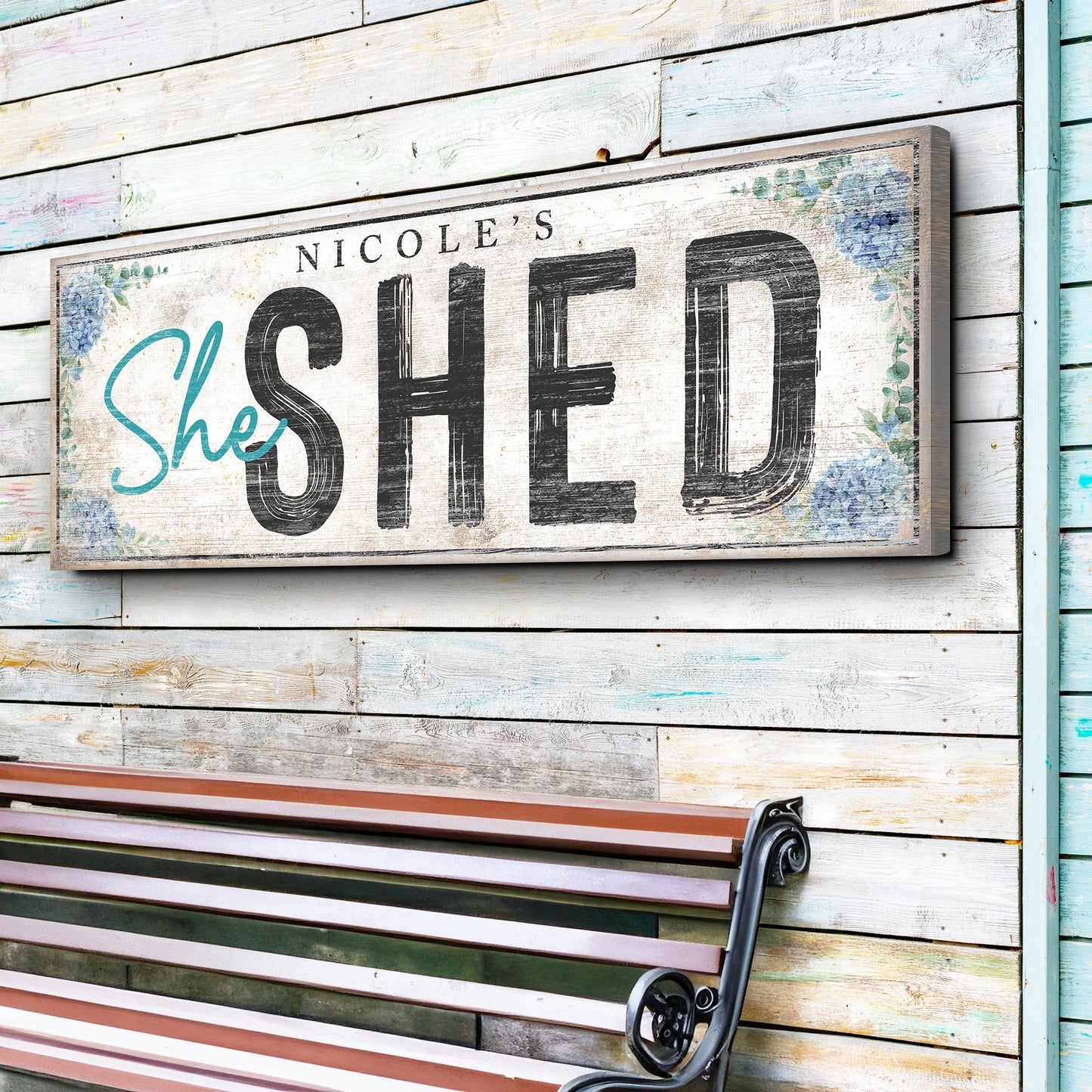 Personalized She Shed Sign XI canvas with distressed vintage lettering and floral border on Tampa Home & Garden Store
