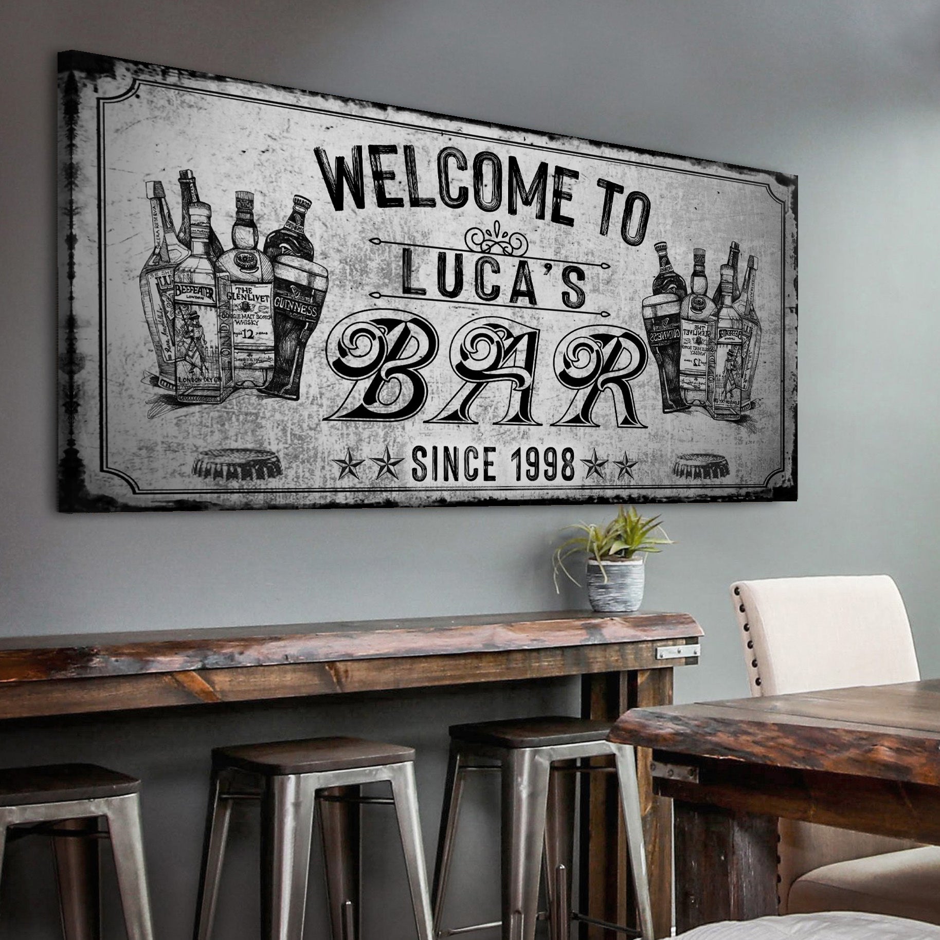 Bar sign canvas with vintage liquor bottles and Welcome to Luca's Bar lettering Tailored Canvases on Tampa Home & Garden Store