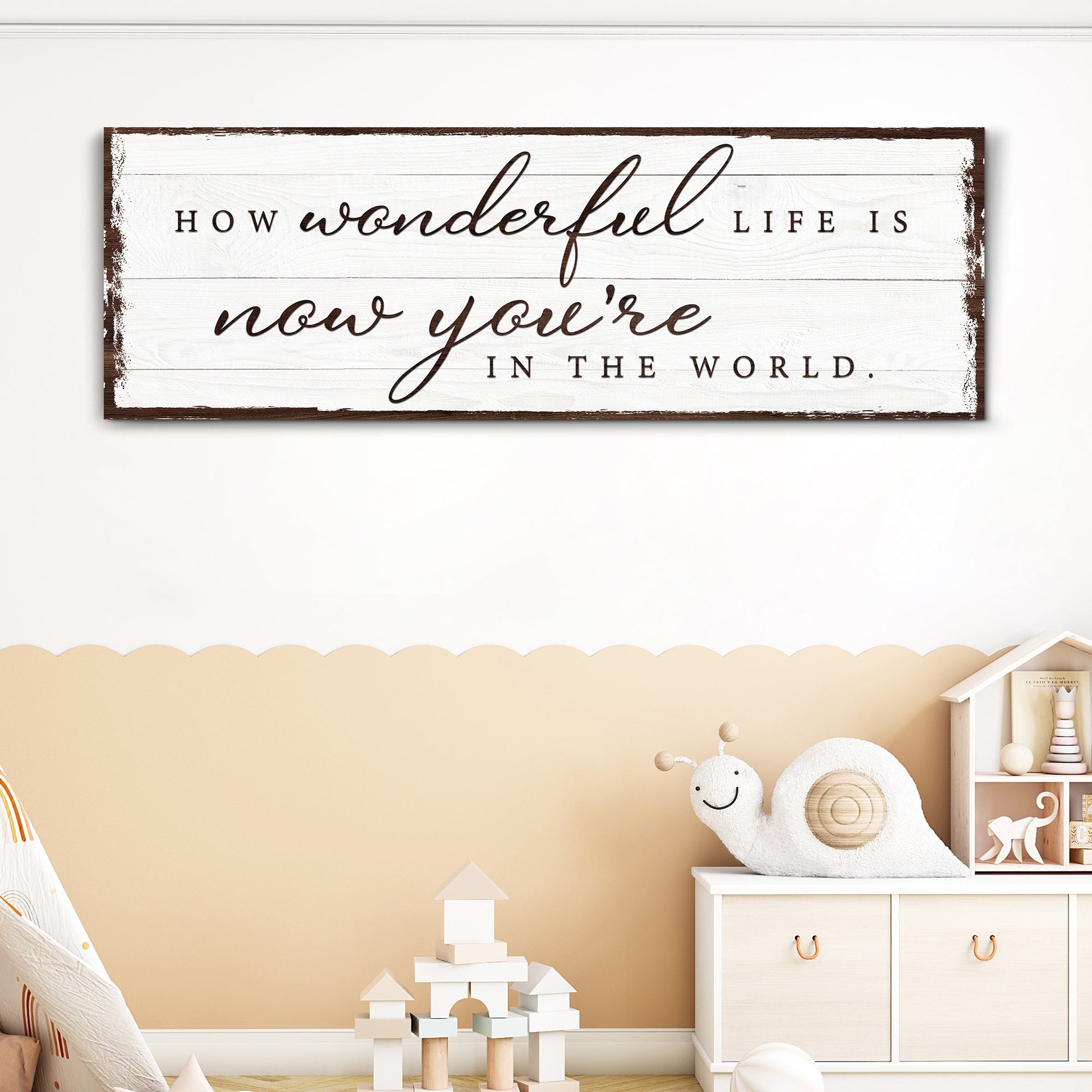 Canvas sign How Wonderful Life Is Now You're In The World Sign IV on white wood planks on Tampa Home & Garden Store