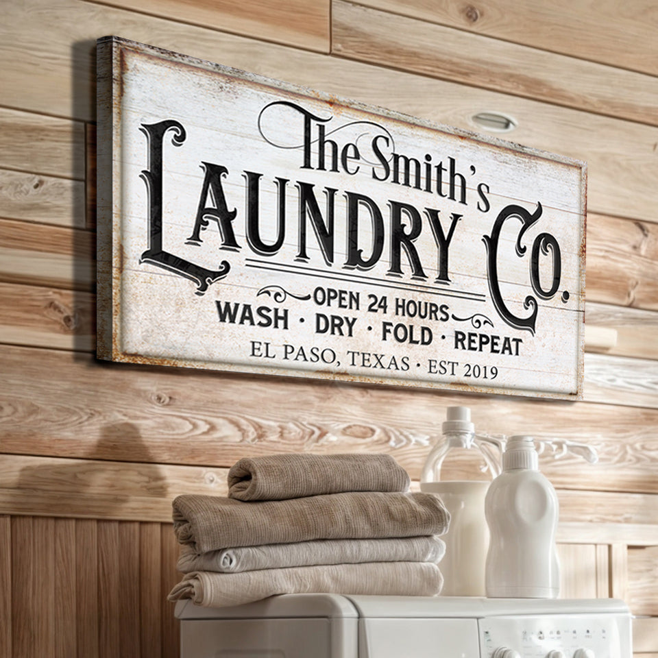 Crafting canvas wall art The Laundry Room Sign IX by Tailored Canvases, rustic whitewashed sign with bold black typography on Tampa Home & Garden Store
