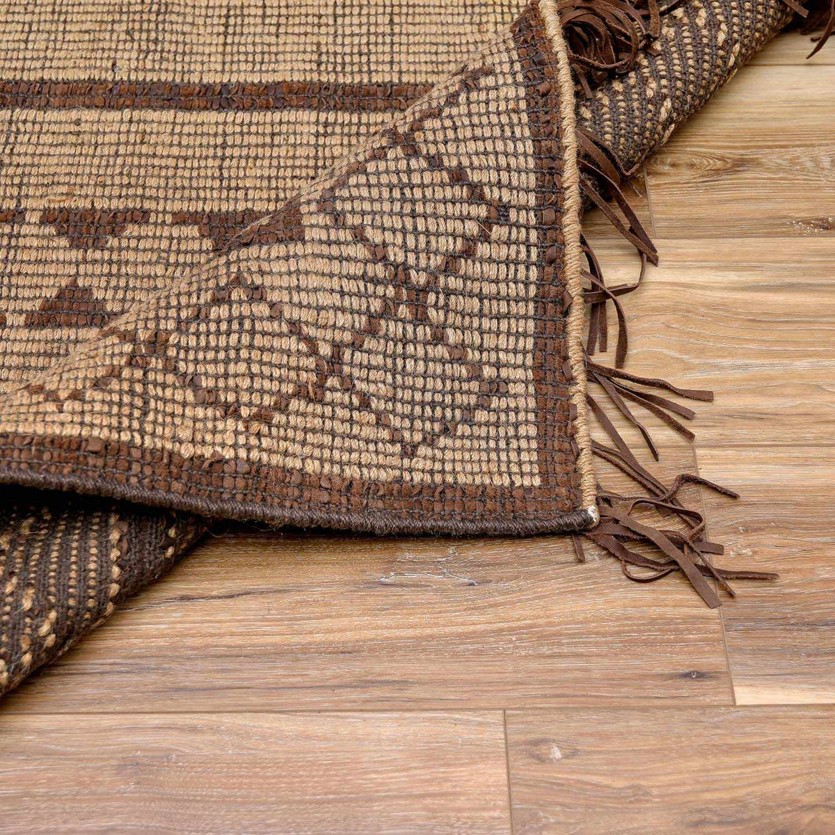 Maia Jute & Leather Area Rug beige brown woven with leather fringe by Boutique Rugs on Tampa Home & Garden Store