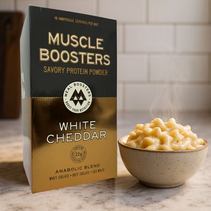 Muscle Boosters White Cheddar protein powder box beside bowl of cheese sauce by Meal Boosters on Tampa Home & Garden Store