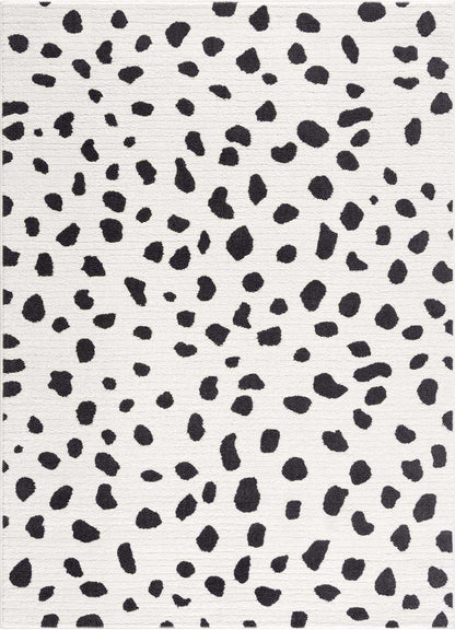 Tariffville Dalmatian Rug by Boutique Rugs, white field with scattered black spots, modern area rug on Tampa Home & Garden Store