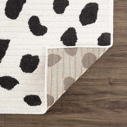 Tariffville Dalmatian Rug by Boutique Rugs, ivory shag with bold black spots on Tampa Home & Garden Store