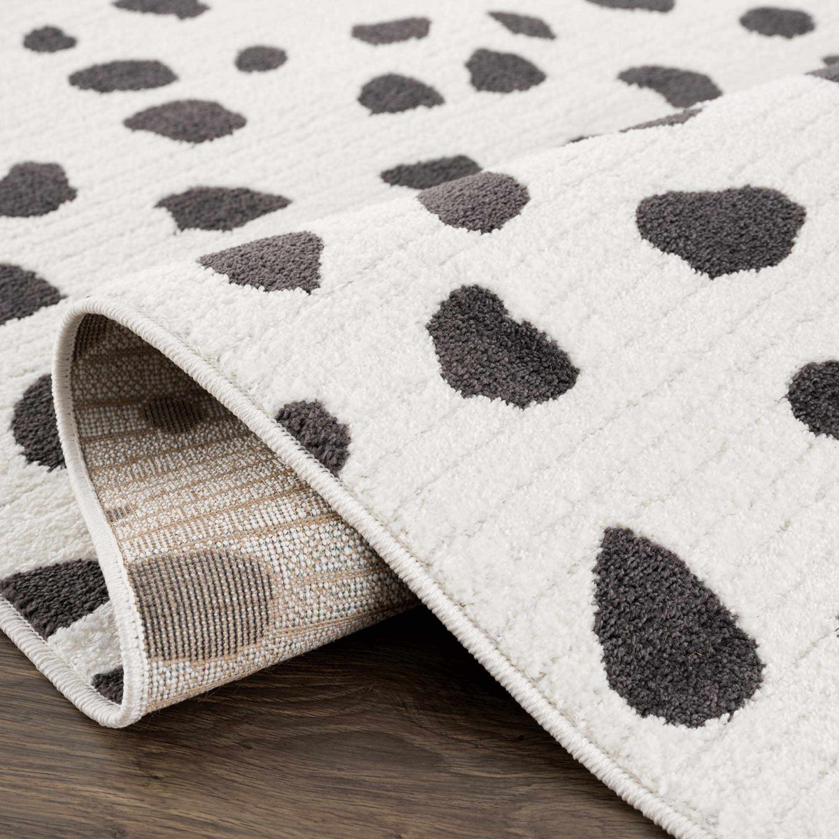 Tariffville Dalmatian Rug by Boutique Rugs white shag with gray spots on Tampa Home & Garden Store