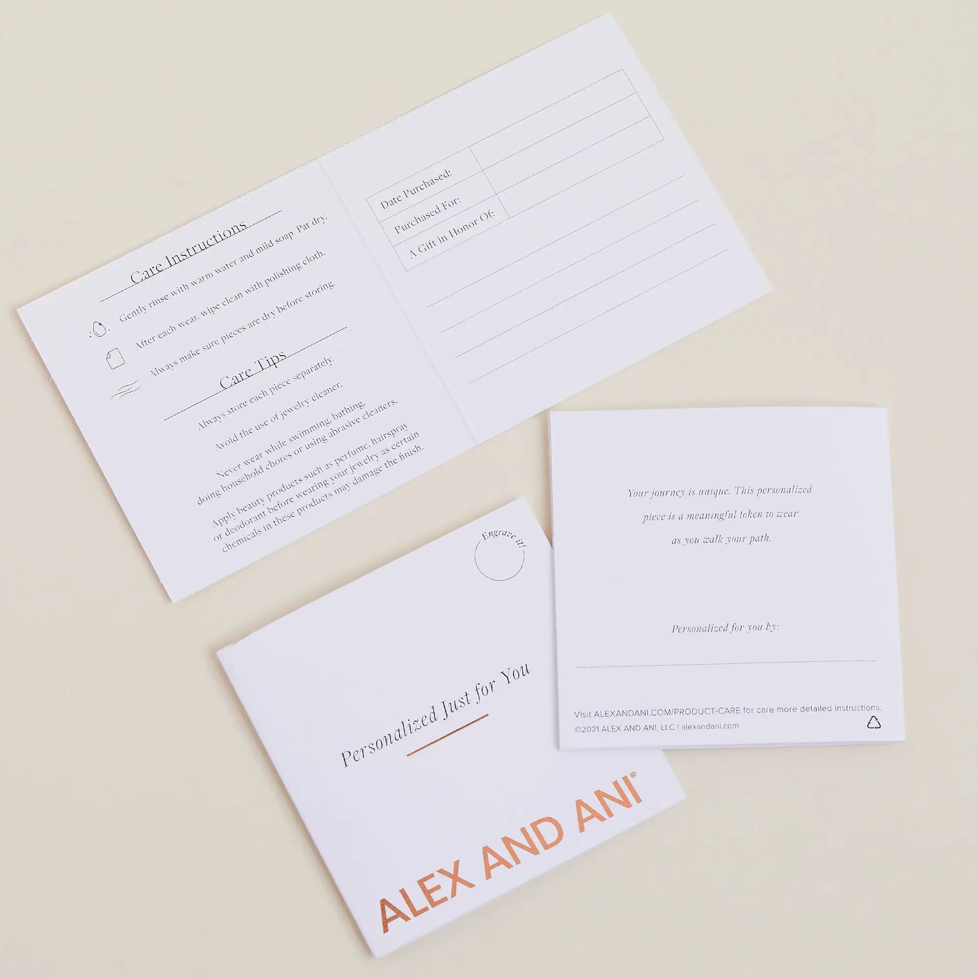 Square Charm Necklace 21'' packaging cards with visible ALEX AND ANI branding on Tampa Home & Garden Store