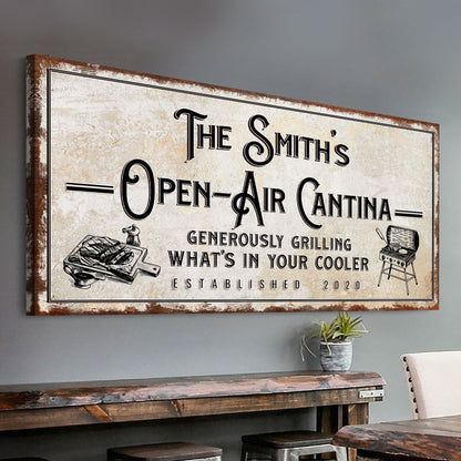 Family Open Air Cantina canvas sign by Tailored Canvases with a weathered beige finish on Tampa Home & Garden Store
