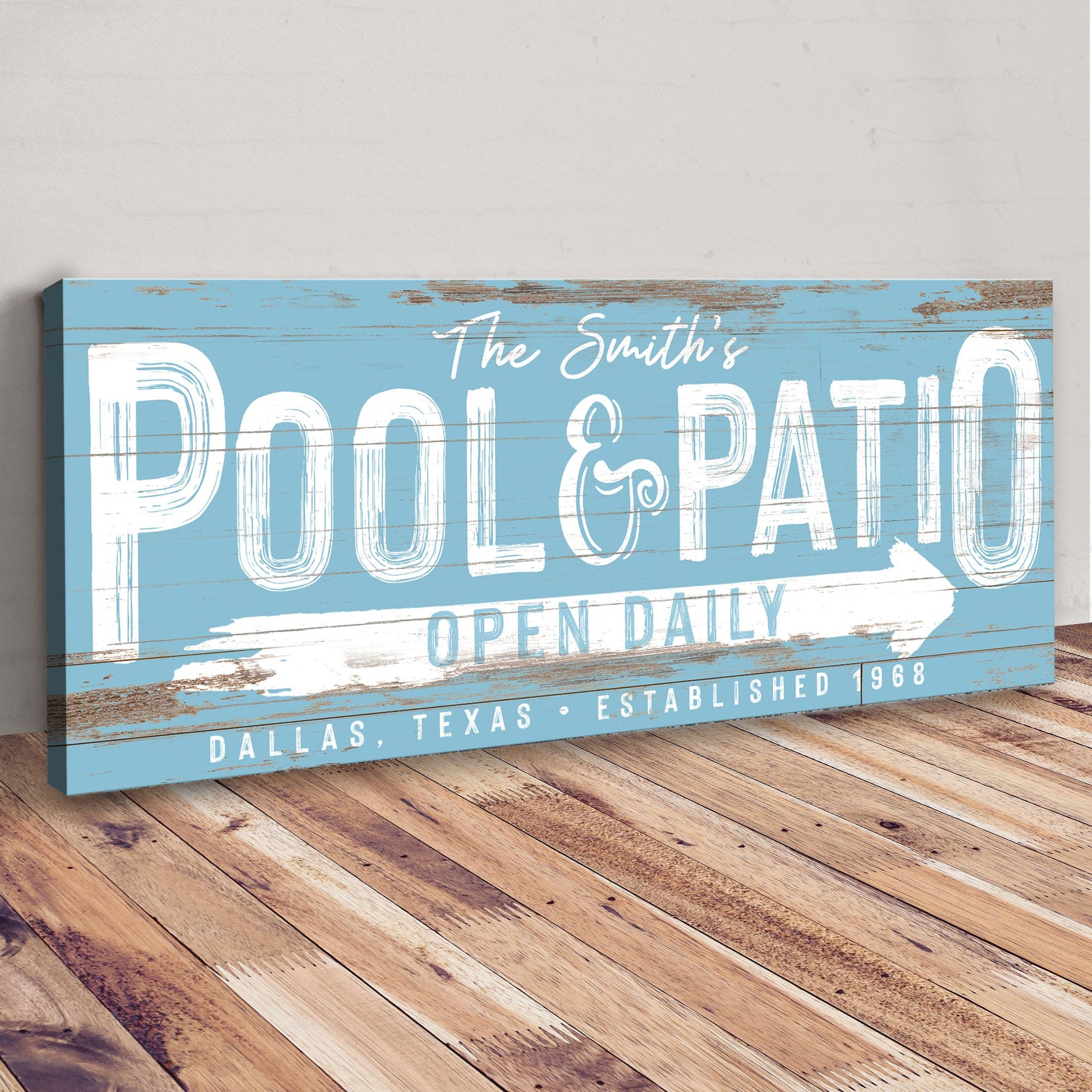 Personalized pool and patio sign canvas in blue with white distressed lettering on Tampa Home & Garden Store