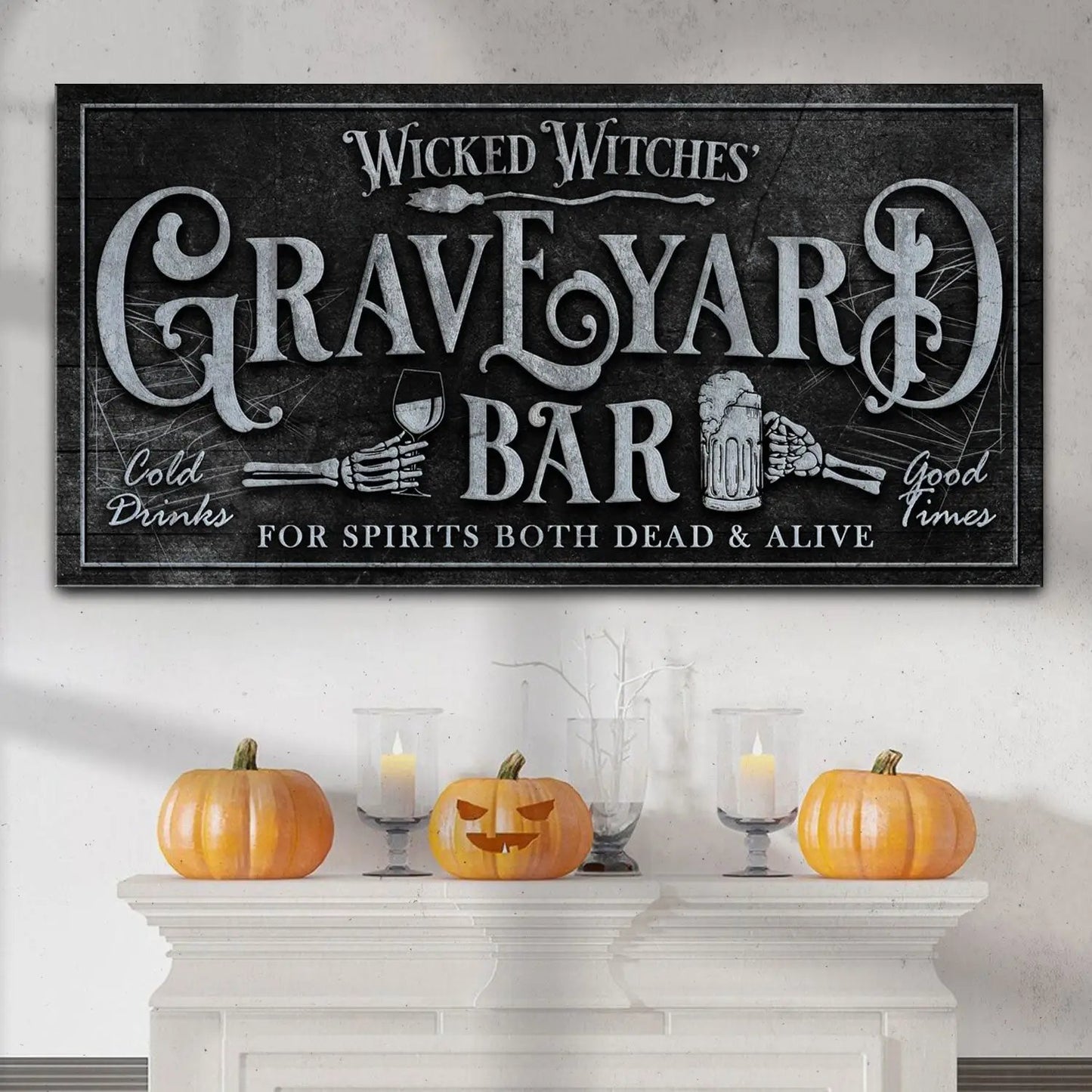 Wicked Witches' Graveyard Bar canvas sign with GRAVEYARD lettering and hands on Tampa Home & Garden Store