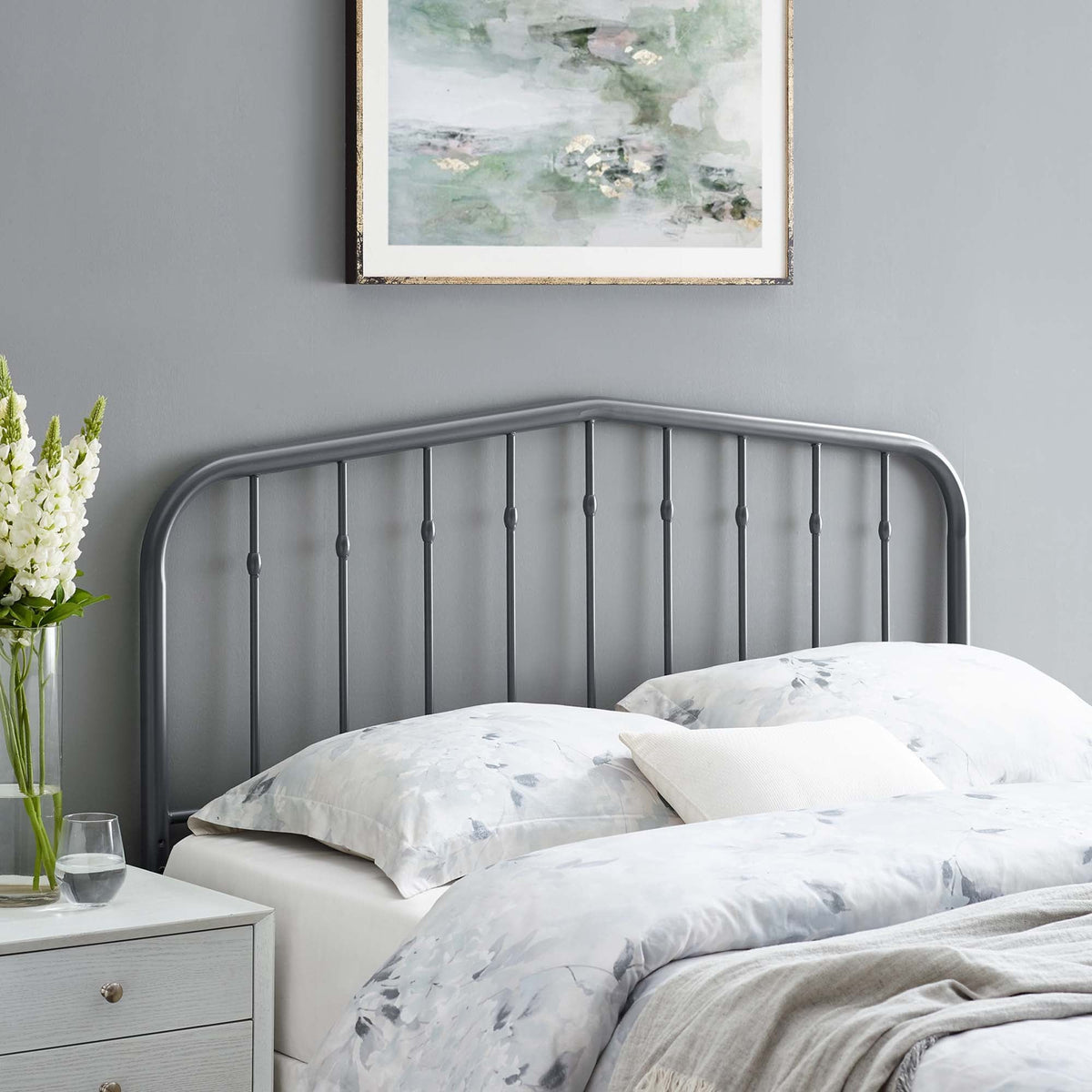 Lennon Metal Headboard in dark gray with vertical bars and rounded posts in a cozy bedroom on Tampa Home & Garden Store