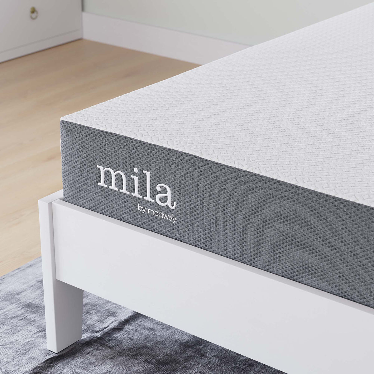 Mila 8in Twin Mattress by Modway on white bed with textured gray fabric sides on Tampa Home & Garden Store