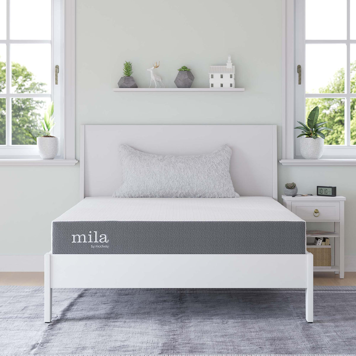 Mila 8-inch twin mattress by Modway, gray fabric on white bed in bright room with plants on Tampa Home & Garden Store