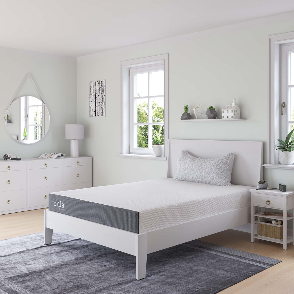 Mila 8-inch Twin Mattress on white bed frame in bright pastel bedroom with dresser decor on Tampa Home & Garden Store