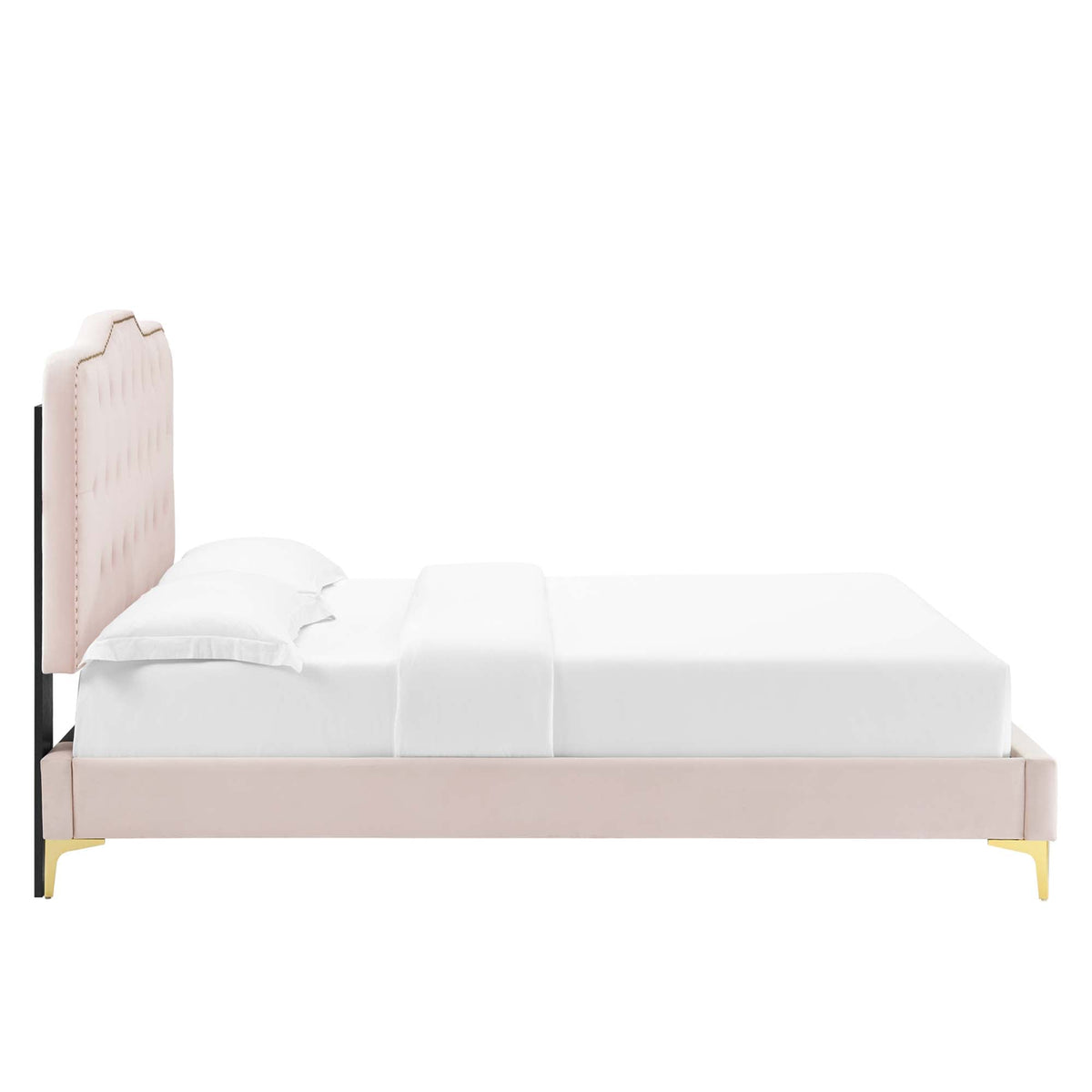 Amber tufted velvet platform bed with pale pink headboard and white bedding on Tampa Home & Garden Store
