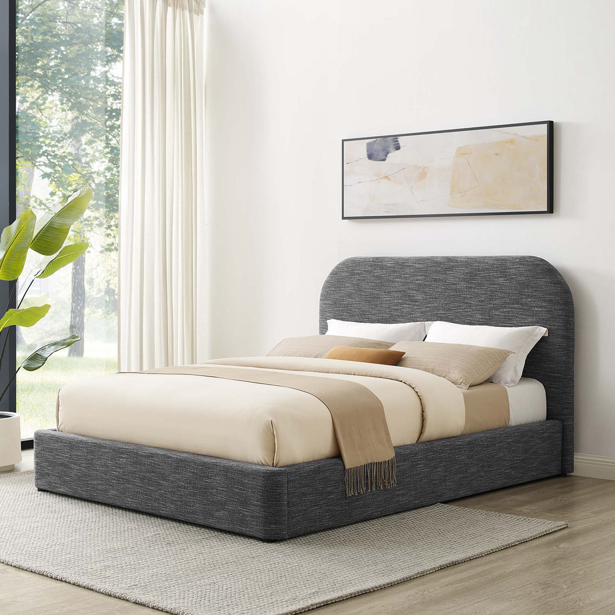 Keynote Upholstered Curved Queen Platform Bed in dark gray fabric with beige bedding on Tampa Home & Garden Store