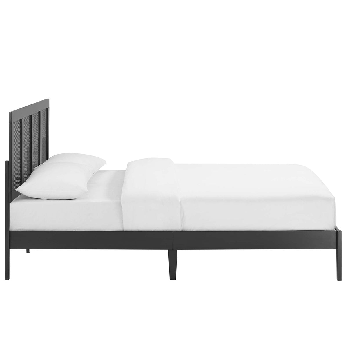 Sirocco rattan and wood platform bed in black with slatted headboard and white bedding on Tampa Home & Garden Store
