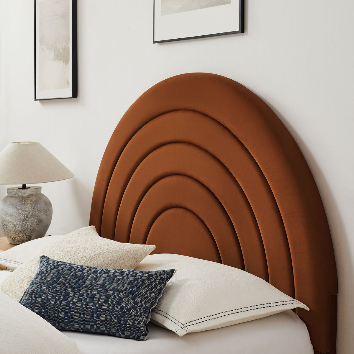 Solana arched velvet king platform bed in burnt orange by HouseOfZazla with plush pillows on Tampa Home & Garden Store