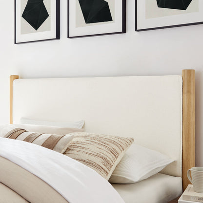 Maven Boucle Upholstered Platform Bed with beige fabric and wood posts in a calm bedroom on Tampa Home & Garden Store