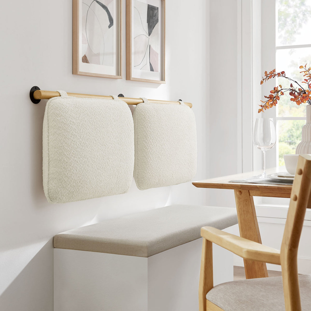 Two white chenille towels on wall-mounted wooden towel bar with black mounts, abstract art on Tampa Home & Garden Store