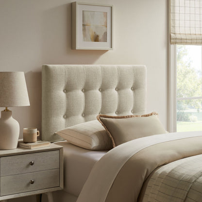 Emily Fabric Upholstered Headboard in light beige tufted fabric for bed in a neutral bedroom on Tampa Home & Garden Store