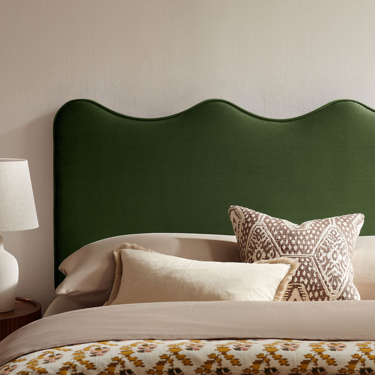 Athena stain-resistant performance velvet headboard in emerald green with scalloped edge on Tampa Home & Garden Store
