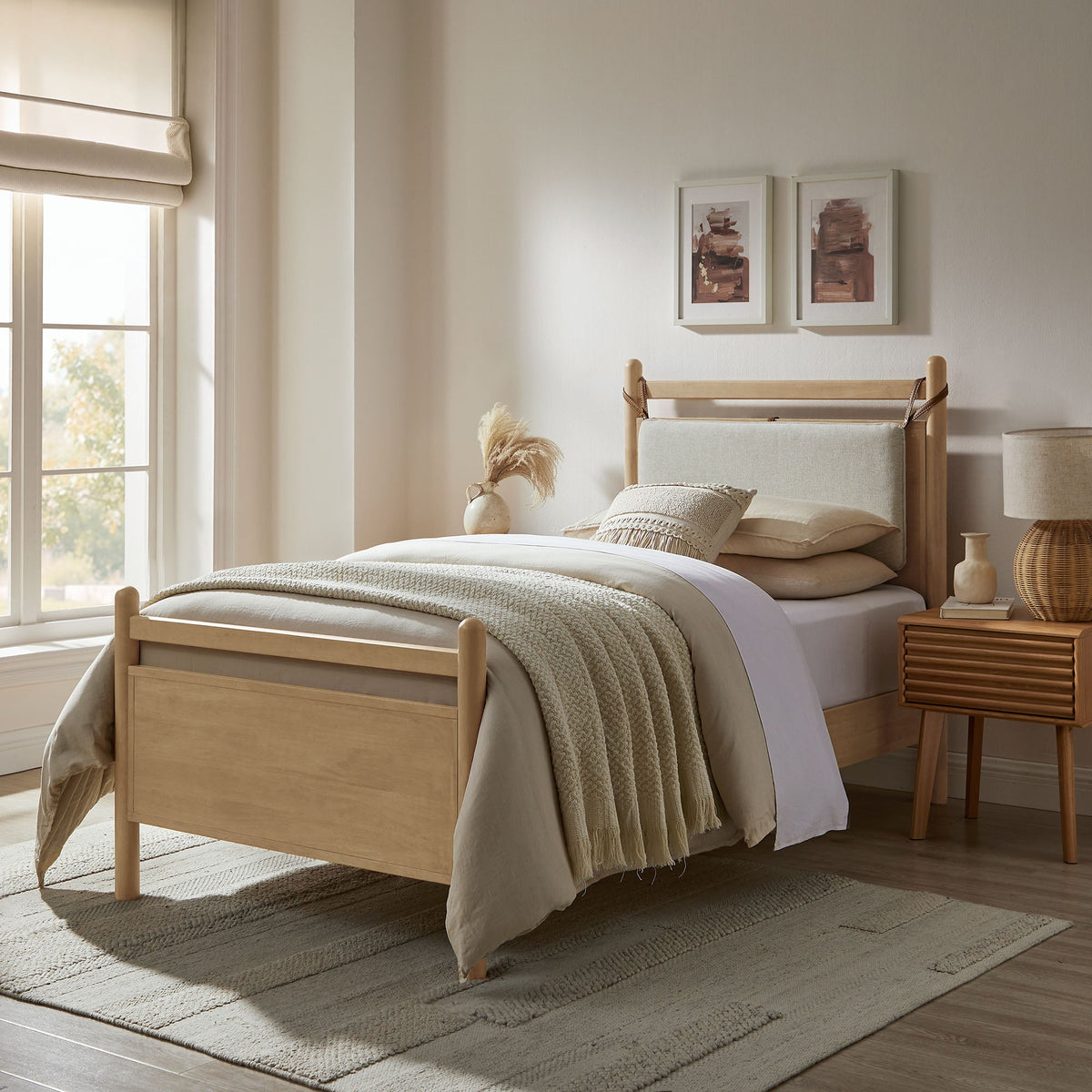 Leni Wood Platform Bed Frame in natural finish with beige bedding and knitted throw on Tampa Home & Garden Store
