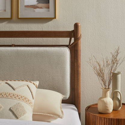 Leni wood platform bed frame with beige bed skirt and warm oak posts in a neutral bedroom on Tampa Home & Garden Store