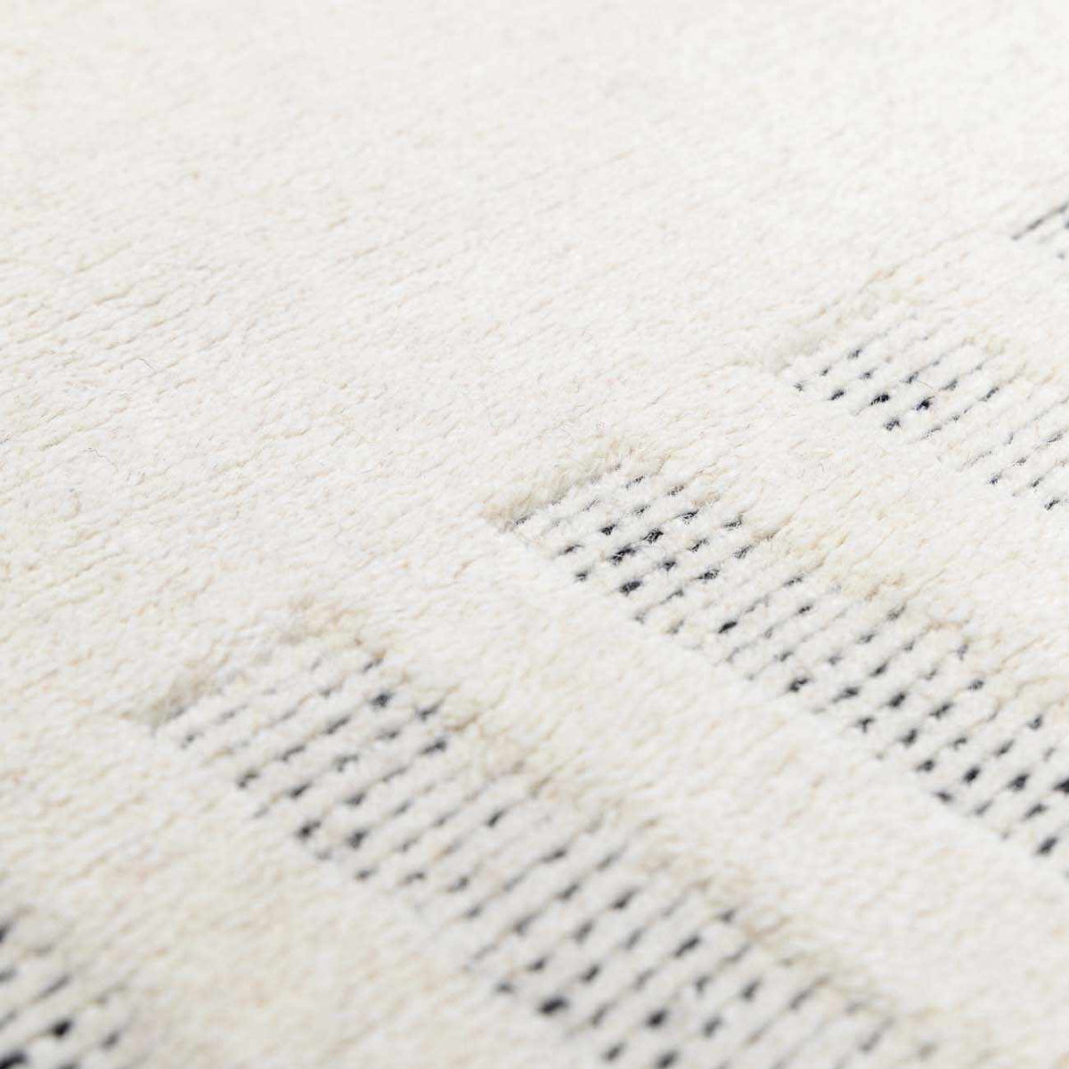 Yulia Wool Area Rug, cream wool with black striped weave, Boutique Rugs clearance on Tampa Home & Garden Store