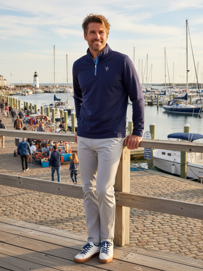 Seaport Pants by White Water Life, light beige trousers worn by a man at a marina on Tampa Home & Garden Store