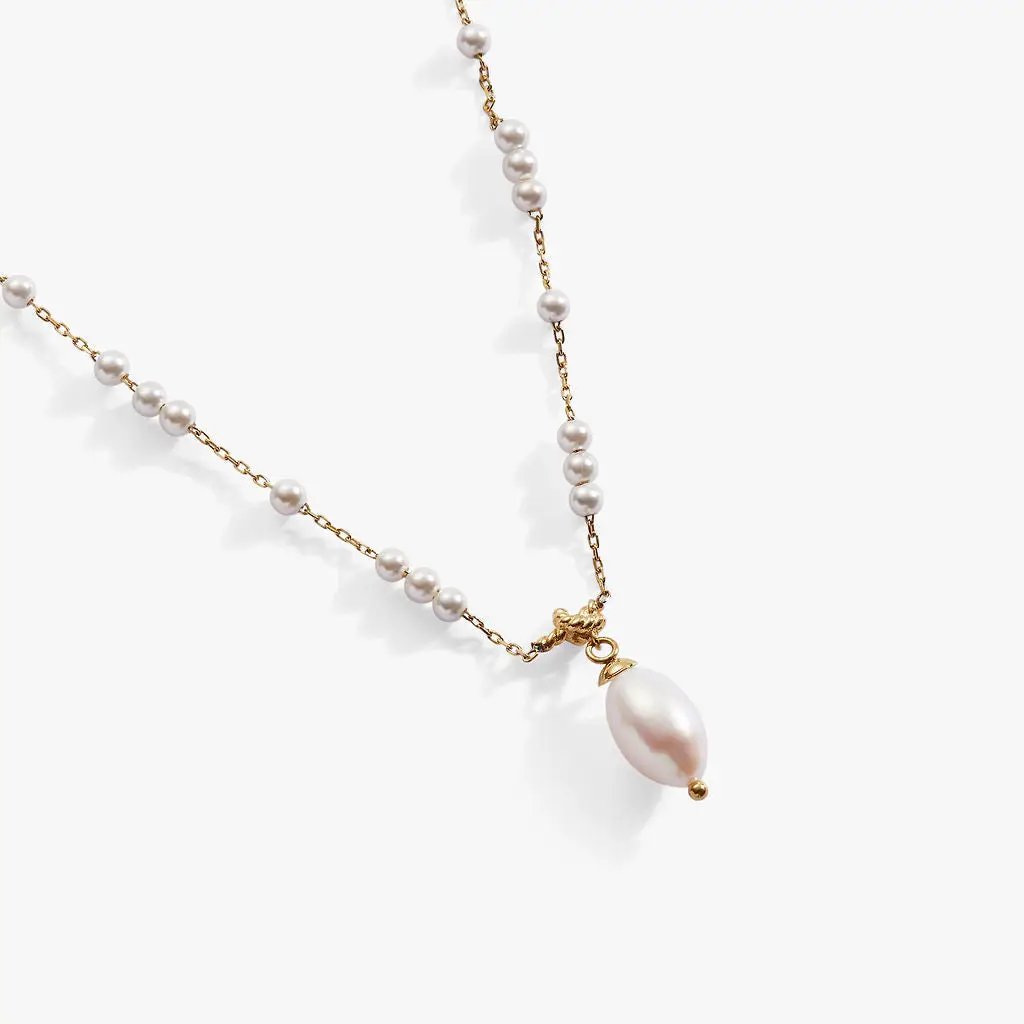 Mother of Pearl Beaded Necklace with pearl bead accents on a gold-tone chain and a teardrop pearl pendant on Tampa Home & Garden Store