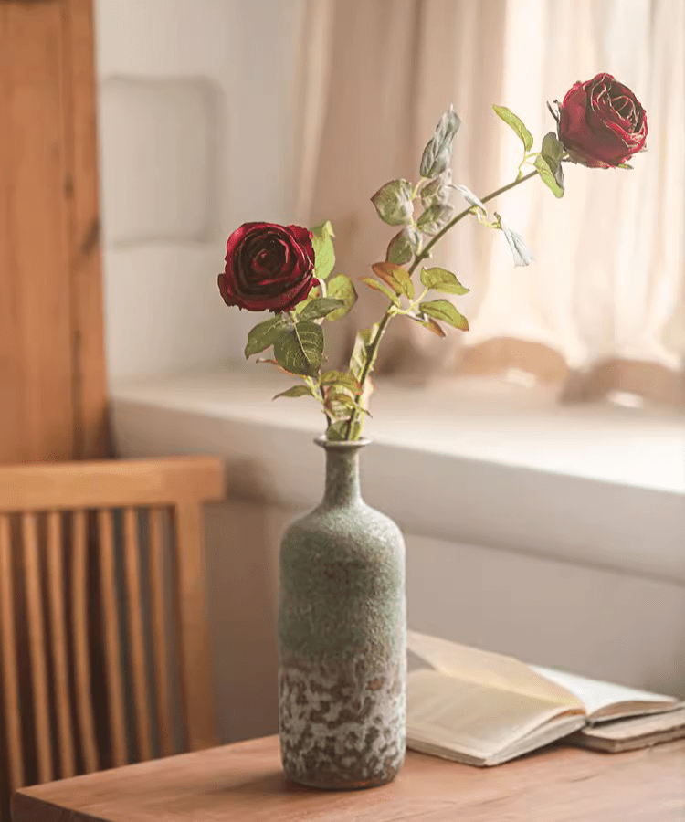Artificial Single Rose Stem pair, 2 stems, red bloom in RusticReach ceramic vase on wooden table on Tampa Home & Garden Store