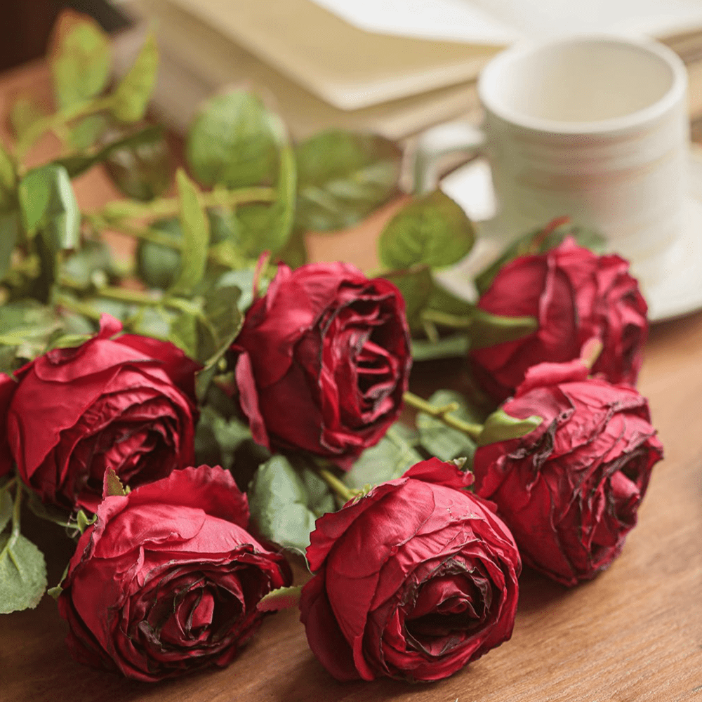 Artificial red rose stems (5) with green leaves on wood surface RusticReach on Tampa Home & Garden Store