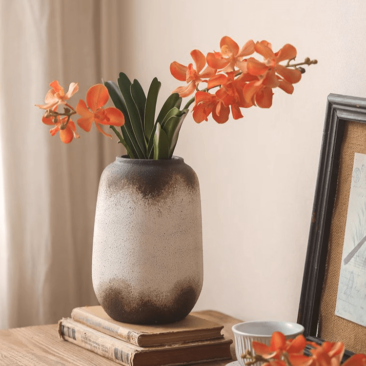 Watertight Brown Imprint Ceramic Vase by RusticReach with dark gradient glaze and orange blooms on Tampa Home & Garden Store