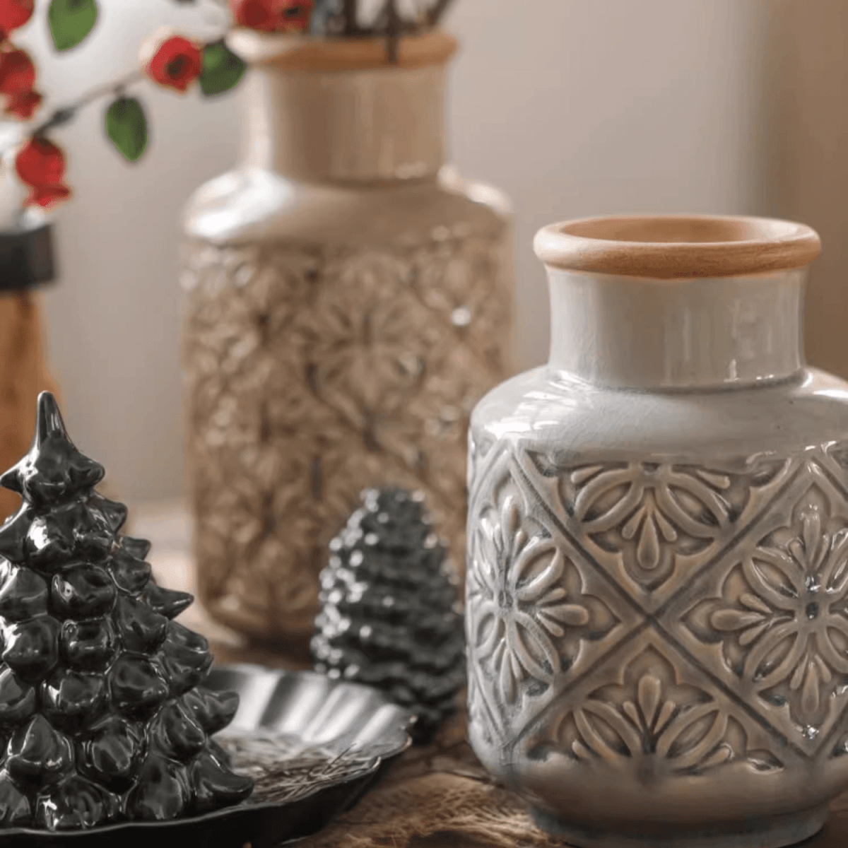 Domino embossed pattern vase in soft gray ceramic with a natural wood rim on Tampa Home & Garden Store