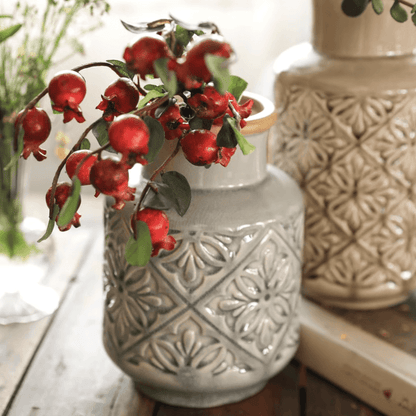 Domino embossed pattern vase by RusticReach, gray ceramic with floral motif and red berry sprigs on Tampa Home & Garden Store