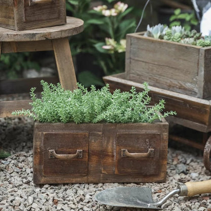 Farmhouse wooden planter box with two small drawers in rustic brown, filled with succulents on Tampa Home & Garden Store