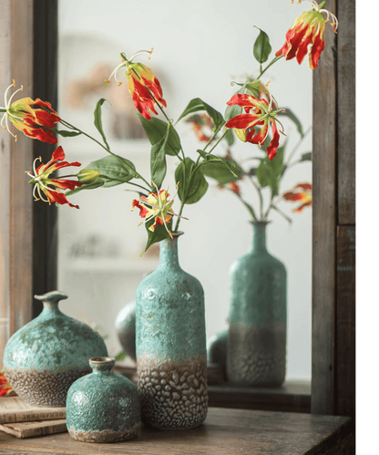 Faux Fire Lily Stem 31.9in tall in turquoise glazed vases with vibrant red-orange blooms on Tampa Home & Garden Store