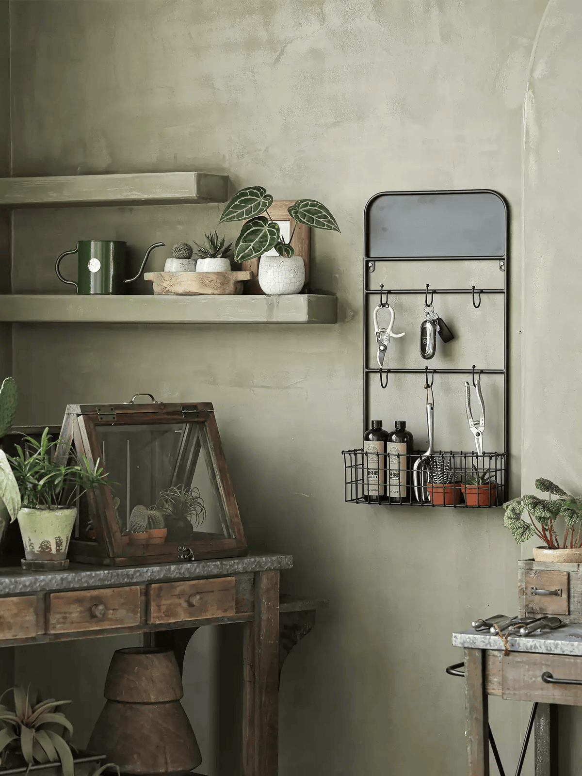 Industrial Garden Tool Storage Rack by RusticReach, matte black metal wall rack with hooks on Tampa Home & Garden Store