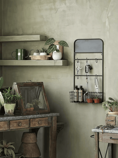 Industrial Garden Tool Storage Rack by RusticReach, matte black metal wall rack with hooks on Tampa Home & Garden Store