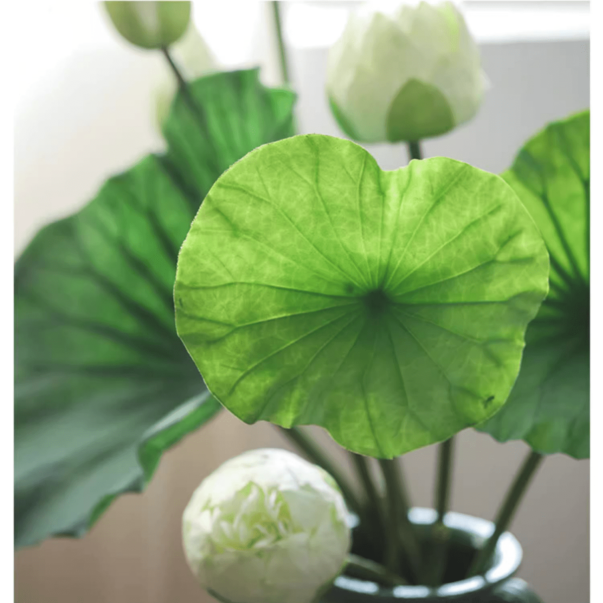 Artificial Lotus Flower and Seedpod RusticReach green leaf white seedpods in a vase on Tampa Home & Garden Store