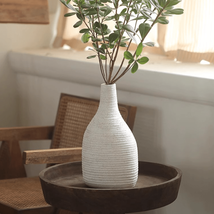 Narrow Neck Vase in White by RusticReach with ribbed ceramic texture holding greenery on Tampa Home & Garden Store